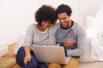 Image showing Couple, laptop and living room for internet, smile and love for home or house date. Man, woman and lounge for technology, tech and social media for bonding and happy relationship or marriage on floor