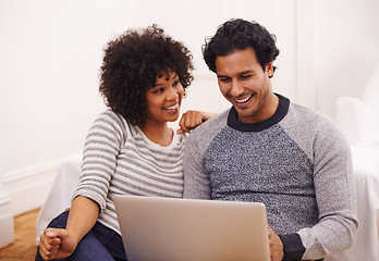 Image showing Couple, laptop and living room with love, smile and technology for home or house date. Man, woman and lounge for internet, tech and social media for bonding and happy relationship or marriage on sofa