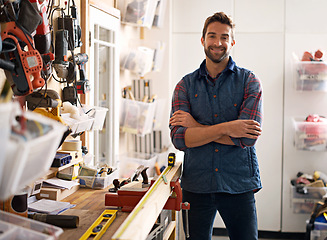 Image showing Tools, contractor and portrait of man in workshop for manufacturing, production and creative small business. Male person, equipment and handyman with confidence for renovation, maintenance or project