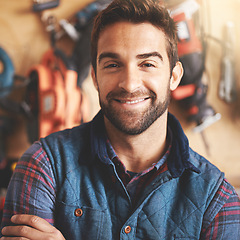 Image showing Handyman, tools and portrait of man for carpentry, home development or building renovation in garage. Construction, lens flare and male employee for diy maintenance, equipment or repair work