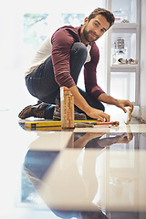 Image showing Tiles, renovation and portrait of man for home improvement, construction and diy project. Tools, development and male employee with equipment for handyman, worker and maintenance service in house