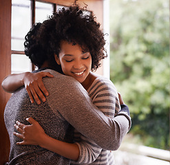 Image showing Smile, couple and hug at door for welcome, greeting or meeting together in home. Happy woman, man and embrace at doorway for visit, support and romantic connection for love in healthy relationship