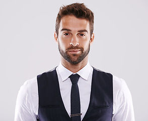 Image showing Studio, confident and man in suit for portrait, stylish and fashion for aesthetic of glamour and classic. Adult, guy and male person in white background, tuxedo and professional for job and career