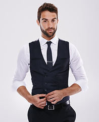 Image showing Portrait, confident and professional man, entrepreneur and suit for fashion with aesthetic of glamour. Adult, guy and male person in white background, tuxedo and luxury for job and career in studio