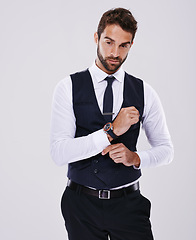 Image showing Studio, portrait and gentleman in suit for fashion, stylish and luxury for aesthetic of glamour and classic. Adult, guy and male person in white background, tuxedo and professional for job and career