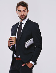 Image showing Coffee, newspaper or man with suit for fashion, style or formal wear isolated on white background. Male person, gentleman or businessman with trendy clothes, class or outfit with confidence in studio