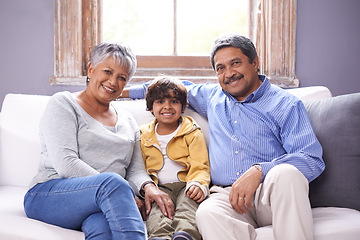 Image showing Smile, sofa and portrait of grandparents with kid for bonding, support and care in living room. Relax, senior people and boy with happiness for childhood development, love and weekend at home