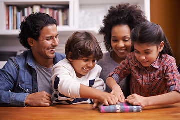 Image showing Excited, present and happy in home of family, parents and love for bonding in house. Birthday, siblings and gift for celebration for Brazilian people, joy and together for quality time and support