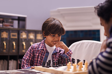 Image showing Child, father and chess game with strategy or checkmate move with knight, king or queen. Son, parent and thinking for competition learning or decision thoughts for playing, contest or problem solving