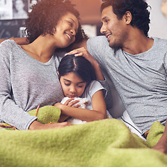 Image showing Parents, sofa and girl sleeping with smile for bonding as happy with support, care and love in living room. Home, happiness and family together with kid in couch for rest or child development