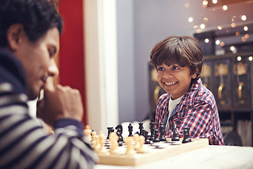 Image showing Child, father and smile for chess strategy or planning checkmate move with knight, king or queen. Son, parent and pawn competition learning or decision thoughts or playing, contest or problem solving