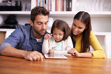 Image showing Man, woman and child at table with tablet for teaching, learning and support in education with love. Elearning, digital app and parents with girl for help in homeschool, growth and development online
