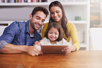 Image showing Mom, dad and kid at table with tablet for teaching, learning and support in education with love. Elearning, digital app and parents with girl child for homeschool movie, growth and development online