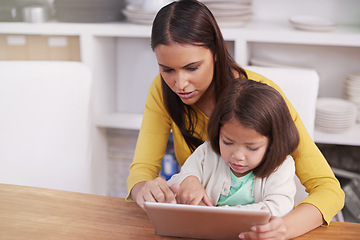 Image showing Typing, home and mother with girl, tablet and bonding together with social media or connection. Online reading, family or mama with daughter or relax with tech or internet with digital app and movie