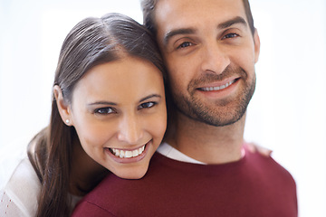 Image showing Portrait, hug and happy couple in a house with love, trust and security, support or bonding at home. Marriage, commitment or face of people in embrace in comfort, safety or gratitude in an apartment