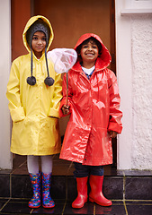 Image showing Children, smile and portrait with raincoat for outdoor, adventure or rainy for growing up, adolescent and winter. Indian kids and happy with boots for trip, play or childhood for sibling and fun