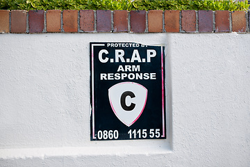 Image showing Security, building and sign on wall with information, notification and message on private property. Signage, symbol and mistake on poster, board and attention for warning, guard and safety service