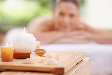 Image showing Candles, petals and holistic healing at spa with aromatherapy, wellness and treatment for self care. Detox, stress relief and energy balance for aura with tools, luxury and natural with zen and calm