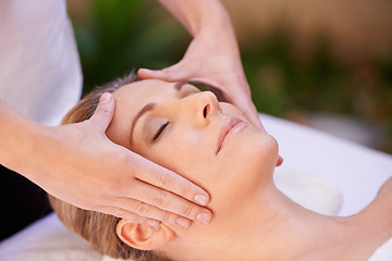 Image showing Calm woman, relax and face massage with masseuse for zen, skincare or stress relief at spa, hotel or resort. Closeup of female person sleeping or asleep in relaxation for facial treatment or beauty