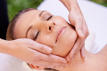 Image showing Calm woman, sleeping and face massage with masseuse for zen, skincare or stress relief at spa, hotel or resort. Closeup of female person asleep in relaxation for facial, beauty or body treatment