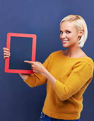 Image showing Woman, studio and portrait to frame board, presentation and mockup for advertisement, customer pointing or checklist. Options, choice with idea for announcement, information with female person