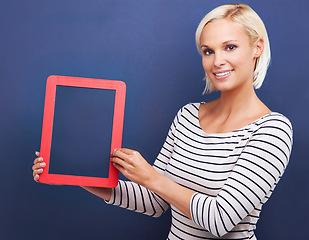 Image showing Woman, studio and smile to frame board, presentation and mockup for advertisement, customer and checklist. Options, choice with idea for announcement and notification, information with female person