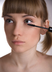 Image showing Applying make-up. 