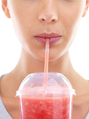 Image showing Woman, juice and straw in studio for fruit, healthy and smoothie for drink and vitamin. Young person or model and beverage for cold, refresh and strawberry for delicious and icy in plastic cup