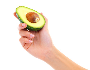 Image showing Avocado, fruit and hand for healthy, food and eat for detox and pulp for delicious. Green, organic and showing for nutrition and vitamin for vegan and meal for diet and yum on white background
