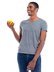 Image showing Man, lemon and fruit for healthy and fresh for diet, immune system and vitamin. African person or dietician and smile with joy for snack, detox and citrus for antioxidant on white background