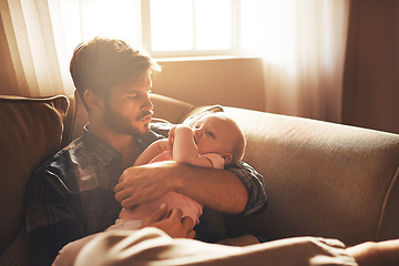 Image showing Family, morning and father with baby on sofa for bonding, relationship and care for parenting. Happy, home and dad with newborn infant for child development, support and affection in living room