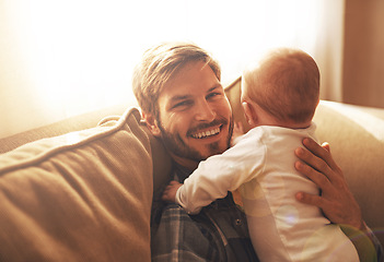 Image showing Family, sofa and portrait of father with baby for bonding, relationship and care for parenting. Morning, home and happy dad and newborn infant for child development, love and affection in living room