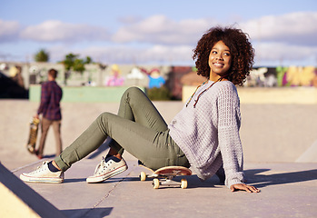 Image showing Black woman, smile and skateboard at skatepark for hobby outdoor to practice, training and relax in Atlanta. Female person, skater and happy with sport activity to chill, fun and leisure or break