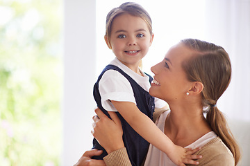 Image showing Mom, kid and hug for love and security, happy in portrait with bonding and care at family home. Safety, trust and affection with embrace to nurture and people with joy and comfort for connection