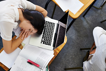 Image showing Laptop, education and woman student sleeping on desk in class with exhaustion or fatigue from above. Computer, burnout or tired and young person asleep in school classroom with books for study