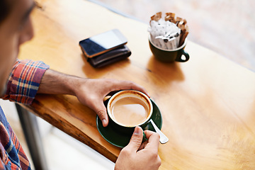 Image showing Man, hands and coffee with breakfast for morning beverage or caffeine at indoor restaurant. Closeup of male person with drink, mug or cup of latte, cappuccino or espresso on desk or table at cafe