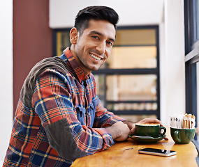 Image showing Happy man, portrait and coffee at cafe for morning, breakfast or drink at indoor restaurant. Young male person or freelancer with smile for latte, customer service or cappuccino at cafeteria or shop