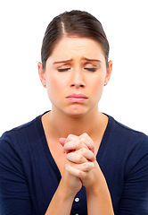 Image showing Praying, hands and sad woman in studio with prayer for hope, help or solution on white background. Pray, worship and female model with praise for stress, anxiety or support, grace or faith in God