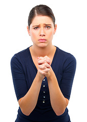 Image showing Praying, hands or portrait of sad woman in studio with prayer for hope, help or solution on white background. Pray, worship or model with praise for stress, anxiety or support, grace or faith in God