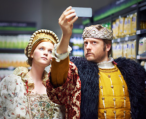 Image showing Selfie, supermarket and king and queen in costume for social media, online post and internet memories. Medieval fashion, renaissance and people take picture in market, store and shop in royal outfit