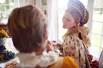 Image showing King, queen and people with tea in castle, smile and conversation in vintage clothes with luxury at breakfast. Woman, man and couple with drink in morning with Victorian fashion at regal palace in UK