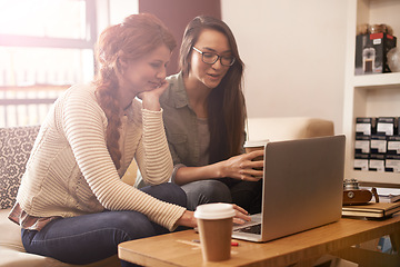 Image showing Coffee shop, meeting and business women on laptop for conversation, talking or discussion for remote work. Freelance, teamwork and people on computer for internet, research and website in restaurant