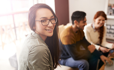 Image showing Happy, business people and portrait of woman in meeting, discussion and conversation for ideas. Teamwork, creative agency and men and women in cafe for brainstorming, planning and collaboration