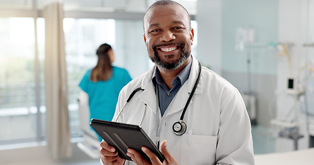 Image showing Hospital, face and black man with a tablet, doctor and typing with website info, internet and consultant. African person, portrait and medical professional with tech, clinic and research with email