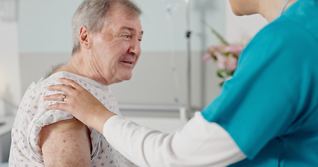 Image showing Doctor, bandage and senior man with vaccine, injection and medicine in hospital for medical service. Healthcare, consulting and nurse with elderly patient for virus protection, plaster and safety