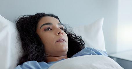 Image showing Woman, bed and tired in hospital, wake up and fear for results of medical test, exam or update on wellness. Sick girl, worry and anxiety with choice, decision or fatigue in clinic, healthcare or icu