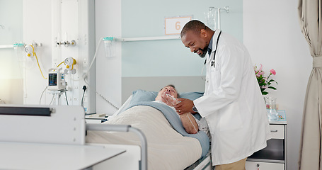 Image showing Consultation, healthcare and doctor with patient in hospital after surgery, treatment or procedure. Discussion, checkup and African male medical worker talk to senior man in clinic bed for diagnosis.