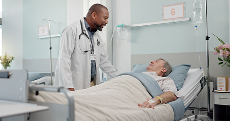 Image showing Consultation, healthcare and doctor with patient in hospital after surgery, treatment or procedure. Discussion, checkup and African male medical worker talk to senior man in clinic bed for diagnosis.