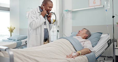Image showing Consultation, stethoscope and doctor with patient in hospital after surgery, treatment or procedure. Discussion, checkup and African male medical worker talk to senior man in clinic bed for diagnosis