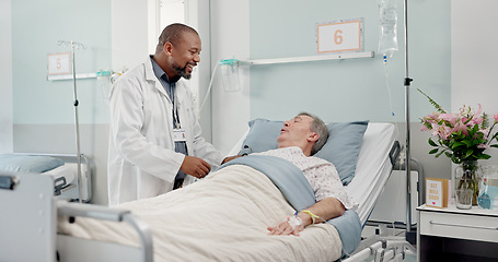 Image showing Consultation, healthcare and doctor with senior man in hospital after surgery, treatment or procedure. Discussion, checkup and African male medical worker talk to patient in clinic bed for diagnosis.